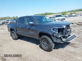 2019 Toyota Tacoma SR z VIN 3TMCZ5AN9KM275537, wystawiony jako IAAI lot #41956988 z przebiegiem 102 933 mil mil oraz . Historia ofert i sprzedaży dostępna na DreamBid. Obrazek 1.