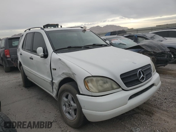 2000 Mercedes-Benz M-Class with VIN 4JGAB54E2YA170332, listed as a Copart auction lot 73206804 with 121,910 mi miles and Non Repairable. Bid and sale history available at carsss.com. Image 4.