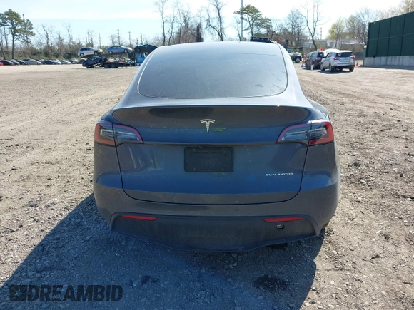 2022 Tesla Model Y Long Range with VIN 7SAYGDEE2NF460945, listed as a IAAI auction lot 41921645 with 62,318 mi miles and . Bid and sale history available at DreamBid. Image 15.