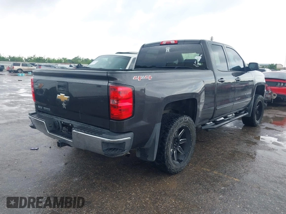 2016 Chevrolet Silverado 1500 LT with VIN 1GCVKREH3GZ233606, listed as a IAAI auction lot 42111728 with 90,449 mi miles and . Bid and sale history available at DreamBid. Image 4.