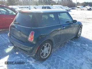 2003 MINI Hardtop S z VIN WMWRE33473TD72981, wystawiony jako IAAI lot #41599521 z przebiegiem 97 403 mil mil oraz . Historia ofert i sprzedaży dostępna na DreamBid. Obrazek 4.