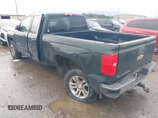 2014 Chevrolet Silverado 1500 LT with VIN 1GCRCREH7EZ340962, listed as a IAAI auction lot 41470994 with 179,326 mi miles and . Bid and sale history available at DreamBid. Image 3.