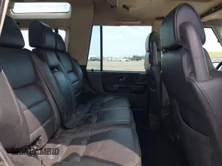 2004 Land Rover Discovery SE with VIN SALTW19464A860565, listed as a IAAI auction lot 42019860 with 153,274 mi miles. Bid and sale history available at carsss.com. Image 8.