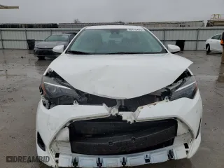 2019 Toyota Corolla L with VIN 5YFBURHE6KP884410, listed as a Copart auction lot 86710474 with 105,265 mi miles and Salvage Title. Bid and sale history available at carsss.com. Image 5.