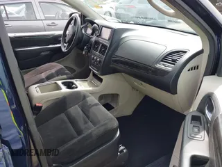 2015 Dodge Grand Caravan SXT with VIN 2C4RDGCG7FR524712, listed as a IAAI auction lot 41956063 with 111,144 mi miles and . Bid and sale history available at DreamBid. Image 5.