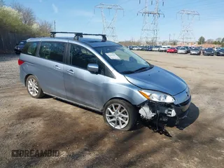 2012 Mazda 5 Grand Touring with VIN JM1CW2DL6C0138979, listed as a IAAI auction lot 41936188 with 57,963 mi miles. Bid and sale history available at carsss.com. Image 1.