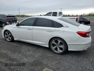 2019 Honda Accord Touring with VIN 1HGCV1F99KA800868, listed as a Copart auction lot 55727515 with 141,714 mi miles and Salvage title. Bid and sale history available at DreamBid. Image 2.