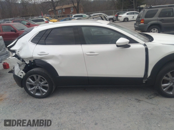 2021 Mazda CX-30 Premium with VIN 3MVDMADL5MM318729, listed as a IAAI auction lot 41645560 with 51,132 mi miles and . Bid and sale history available at DreamBid. Image 14.