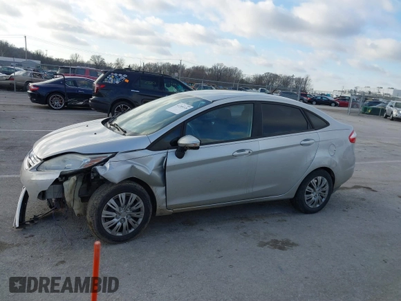 2015 Ford Fiesta SE z VIN 3FADP4BJ1FM220222, wystawiony jako IAAI lot #41209318 z przebiegiem 113 134 mil mil oraz . Historia ofert i sprzedaży dostępna na DreamBid. Obrazek 14.