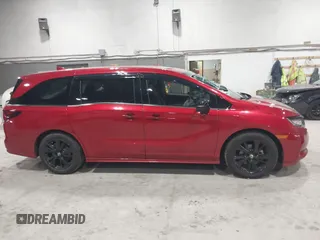 2023 Honda Odyssey Sport z VIN 5FNRL6H75PB054893, wystawiony jako IAAI lot #41984321 z przebiegiem 17 383 mil mil oraz . Historia ofert i sprzedaży dostępna na DreamBid. Obrazek 13.