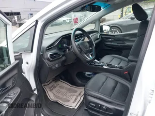 2023 Chevrolet Bolt EV 2LT z VIN 1G1FX6S07P4198027, wystawiony jako IAAI lot #42453916 z przebiegiem 5 133 mil mil oraz . Historia ofert i sprzedaży dostępna na DreamBid. Obrazek 20.