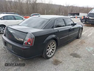2006 Chrysler 300 C SRT8 with VIN 2C3KA73W06H239927, listed as a IAAI auction lot 41837066 with 169,260 mi miles. Bid and sale history available at carsss.com. Image 4.