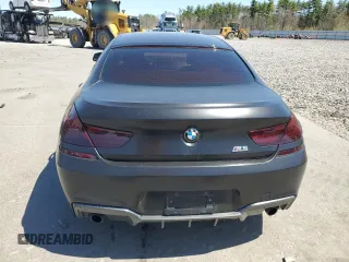 2015 BMW 6 Series 640i xDrive z VIN WBA6B8C53FD453909, wystawiony jako Copart lot #55292765 z przebiegiem 84 971 mil mil oraz Szkoda całkowita • Salvage title. Historia ofert i sprzedaży dostępna na DreamBid. Obrazek 6.