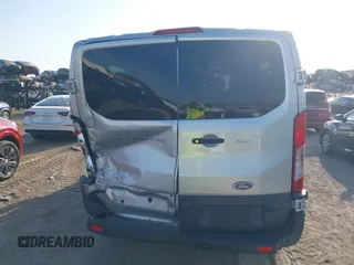 2018 Ford Transit Passenger XL with VIN 1FBZX2YM0JKA70128, listed as a IAAI auction lot 42379000 with 125,309 mi miles and . Bid and sale history available at DreamBid. Image 16.