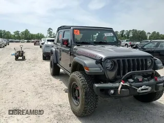 2018 Jeep Wrangler Unlimited Rubicon with VIN 1C4HJXFG6JW166731, listed as a Copart auction lot 56997385 with 117,713 mi miles and Salvage title. Bid and sale history available at DreamBid. Image 12.