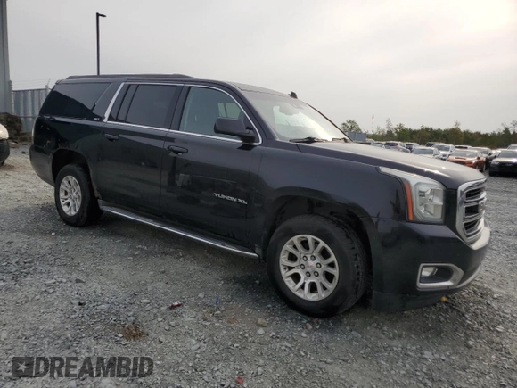 2015 GMC Yukon XL SLT with VIN 1GKS2HKCXFR244997, listed as a Copart auction lot 72238344 with 333,740 mi miles and Clean Title. Bid and sale history available at carsss.com. Image 4.