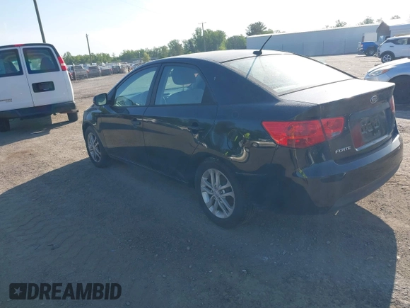 2011 Kia Forte EX with VIN KNAFU4A27B5332784, listed as a IAAI auction lot 42152645 with 237,077 mi miles. Bid and sale history available at carsss.com. Image 3.