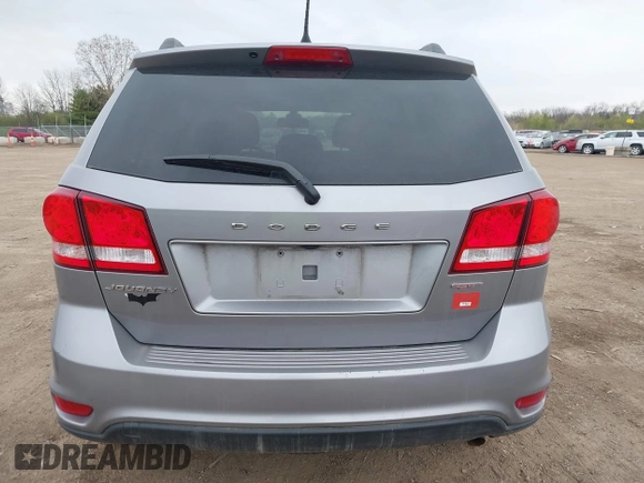2019 Dodge Journey SE with VIN 3C4PDCBBXKT810874, listed as a IAAI auction lot 41960889 with 170,441 mi miles and . Bid and sale history available at DreamBid. Image 16.