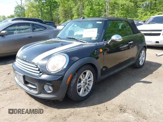 2011 MINI Convertible with VIN WMWZN3C56BT132924, listed as a IAAI auction lot 42161363 with 133,444 mi miles and . Bid and sale history available at DreamBid. Image 2.