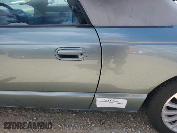 2004 Ford Thunderbird Pacific Coast Roadster with VIN 1FAHP63A04Y108766, listed as a Copart auction lot 74766964 with 30,107 mi miles and Salvage Title. Bid and sale history available at DreamBid. Image 12.