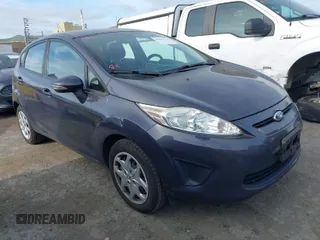 2013 Ford Fiesta SE with VIN 3FADP4EJ6DM205708, listed as a IAAI auction lot 42051721 with 139,143 mi miles. Bid and sale history available at carsss.com. Image 1.