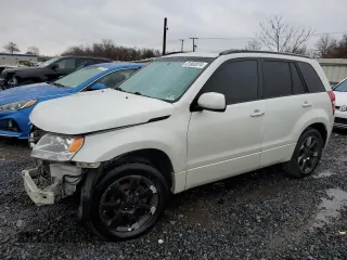2012 Suzuki Grand Vitara Limited z VIN JS3TE0D78C4100206, wystawiony jako Copart lot #81902074 z przebiegiem Nie podano mil oraz Szkoda całkowita • Salvage title. Historia ofert i sprzedaży dostępna na DreamBid. Obrazek 1.