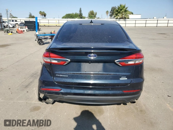 2020 Ford Fusion SE z VIN 3FA6P0HD4LR114834, wystawiony jako Copart lot #60224845 z przebiegiem 84 110 mil mil oraz Szkoda całkowita • Salvage title. Historia ofert i sprzedaży dostępna na DreamBid. Obrazek 6.