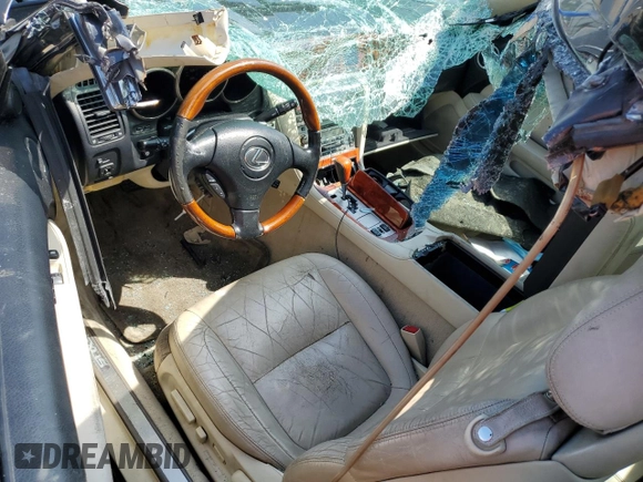 2006 Lexus SC 430 with VIN JTHFN48Y169001884, listed as a Copart auction lot 69249434 with 186,520 mi miles and Salvage Title. Bid and sale history available at DreamBid. Image 8.