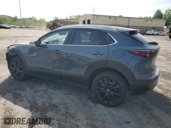2024 Mazda CX-30 S Carbon Edition with VIN 3MVDMBCM0RM641898, listed as a Copart auction lot 57712225 with 9,185 mi miles and Salvage title. Bid and sale history available at DreamBid. Image 2.
