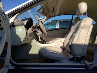 2009 Mercedes-Benz CLK 550 with VIN WDBTK72F69T102852, listed as a Copart auction lot 80244754 with 113,421 mi miles and Salvage Title. Bid and sale history available at DreamBid. Image 7.