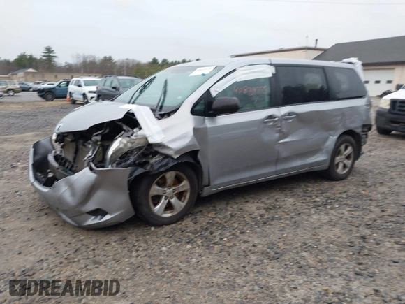 2012 Toyota Sienna with VIN 5TDKA3DC7CS015592, listed as a IAAI auction lot 40839775 with 161,944 mi miles and . Bid and sale history available at DreamBid. Image 2.
