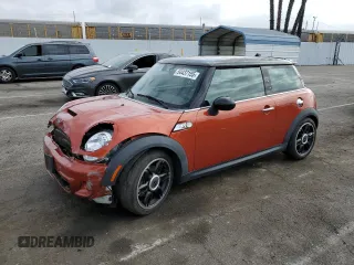 2013 MINI Hardtop S with VIN WMWSV3C57DT477948, listed as a Copart auction lot 54437155 with 63,114 mi miles and Salvage Title. Bid and sale history available at DreamBid. Image 1.