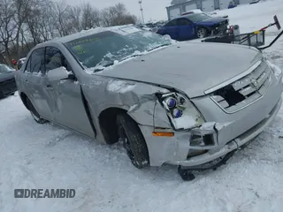 2005 Cadillac STS with VIN 1G6DW677950139768, listed as a IAAI auction lot 41249405 with 253,992 mi miles. Bid and sale history available at carsss.com. Image 1.