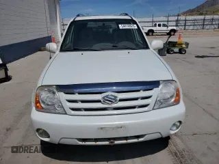 2004 Suzuki XL7 LX z VIN JS3TX92V344101698, wystawiony jako Copart lot #54610825 z przebiegiem 118 152 mil mil oraz Szkody całkowita. Historia ofert i sprzedaży dostępna na DreamBid. Obrazek 5.