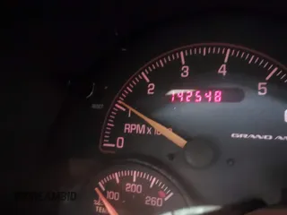 2005 Pontiac Grand Am GT with VIN 1G2NW12E85M140434, listed as a IAAI auction lot 41966294 with 142,548 mi miles. Bid and sale history available at carsss.com. Image 15.