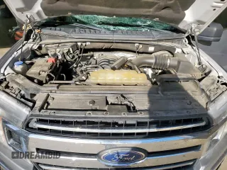 2020 Ford F-150 XL z VIN 1FTEW1C58LFB36332, wystawiony jako Copart lot #57904485 z przebiegiem 116 698 mil mil oraz Szkoda całkowita • Salvage title. Historia ofert i sprzedaży dostępna na DreamBid. Obrazek 11.