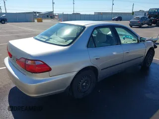 1999 Honda Accord LX with VIN JHMCG5545XC028563, listed as a IAAI auction lot 42461054 with 212,100 mi miles and . Bid and sale history available at DreamBid. Image 4.
