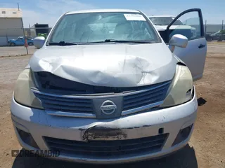 2007 Nissan Versa S z VIN 3N1BC13EX7L362219, wystawiony jako IAAI lot #42359806 z przebiegiem 153 173 mil mil oraz . Historia ofert i sprzedaży dostępna na DreamBid. Obrazek 6.