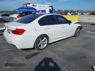 2014 BMW 3 Series 328i with VIN WBA3A5C55EP647035, listed as a IAAI auction lot 41480711 with 105,792 mi miles. Bid and sale history available at carsss.com. Image 4.
