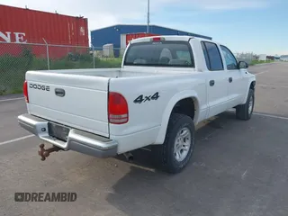 2004 Dodge Dakota SLT with VIN 1D7HG48N44S524998, listed as a IAAI auction lot 42195420 with 197,530 mi miles and . Bid and sale history available at DreamBid. Image 4.