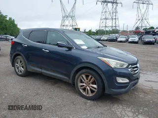 2013 Hyundai Santa Fe Sport z VIN 5XYZWDLA4DG031060, wystawiony jako IAAI lot #42444376 z przebiegiem 143 697 mil mil oraz . Historia ofert i sprzedaży dostępna na DreamBid. Obrazek 1.