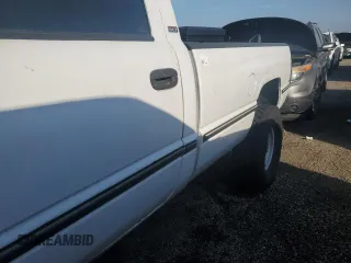 1995 Dodge 2500 with VIN 1B7KF26C9SS304696, listed as a Copart auction lot 76398944 with 217,725 mi miles and Salvage Title. Bid and sale history available at carsss.com. Image 12.