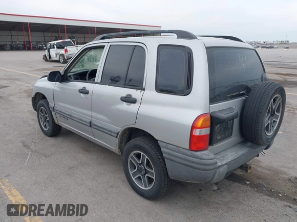 2003 Chevrolet Tracker z VIN 2CNBE134736919970, wystawiony jako IAAI lot #42203446 z przebiegiem 158 872 mil mil oraz . Historia ofert i sprzedaży dostępna na DreamBid. Obrazek 3.