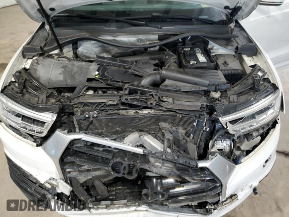 2016 Audi Q3 Prestige z VIN WA1GFCFS7GR000097, wystawiony jako Copart lot #59120825 z przebiegiem 105 063 mil mil oraz Szkoda całkowita • Salvage title. Historia ofert i sprzedaży dostępna na DreamBid. Obrazek 12.