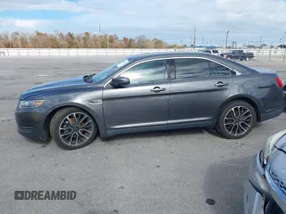 2019 Ford Taurus SEL with VIN 1FAHP2E87KG105434, listed as a IAAI auction lot 41365944 with 54,650 mi miles and . Bid and sale history available at carsss.com. Image 14.