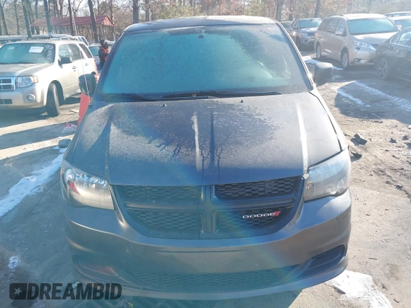 2016 Dodge Grand Caravan SE with VIN 2C4RDGBG1GR357895, listed as a IAAI auction lot 41389733 with 131,175 mi miles and . Bid and sale history available at DreamBid. Image 12.