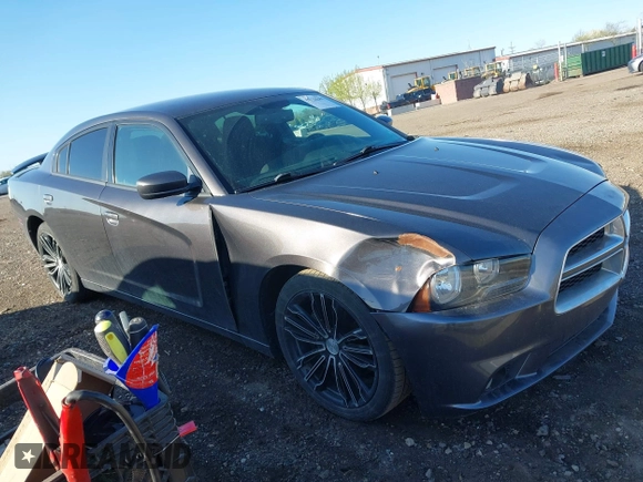 2013 Dodge Charger SXT with VIN 2C3CDXHG3DH593614, listed as a IAAI auction lot 42138282 with 174,243 mi miles. Bid and sale history available at carsss.com. Image 1.