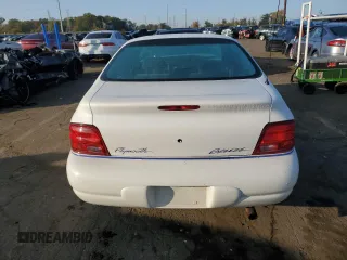 1997 Plymouth Breeze z VIN 1P3EJ46X9VN664404, wystawiony jako Copart lot #76341454 z przebiegiem 88 849 mil mil oraz Tytuł czysty. Historia ofert i sprzedaży dostępna na DreamBid. Obrazek 6.