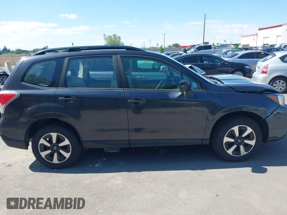 2018 Subaru Forester z VIN JF2SJABC1JH460419, wystawiony jako IAAI lot #42292895 z przebiegiem 141 486 mil mil oraz . Historia ofert i sprzedaży dostępna na DreamBid. Obrazek 13.