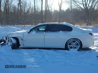 2014 BMW 7 Series 740Li xDrive with VIN WBAYF4C57ED282182, listed as a IAAI auction lot 41324877 with 102,699 mi miles. Bid and sale history available at carsss.com. Image 14.
